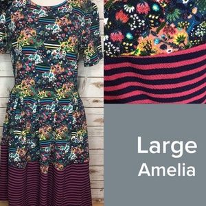 LulaRoe L Amelia Floral with Striped Dipped Bottom